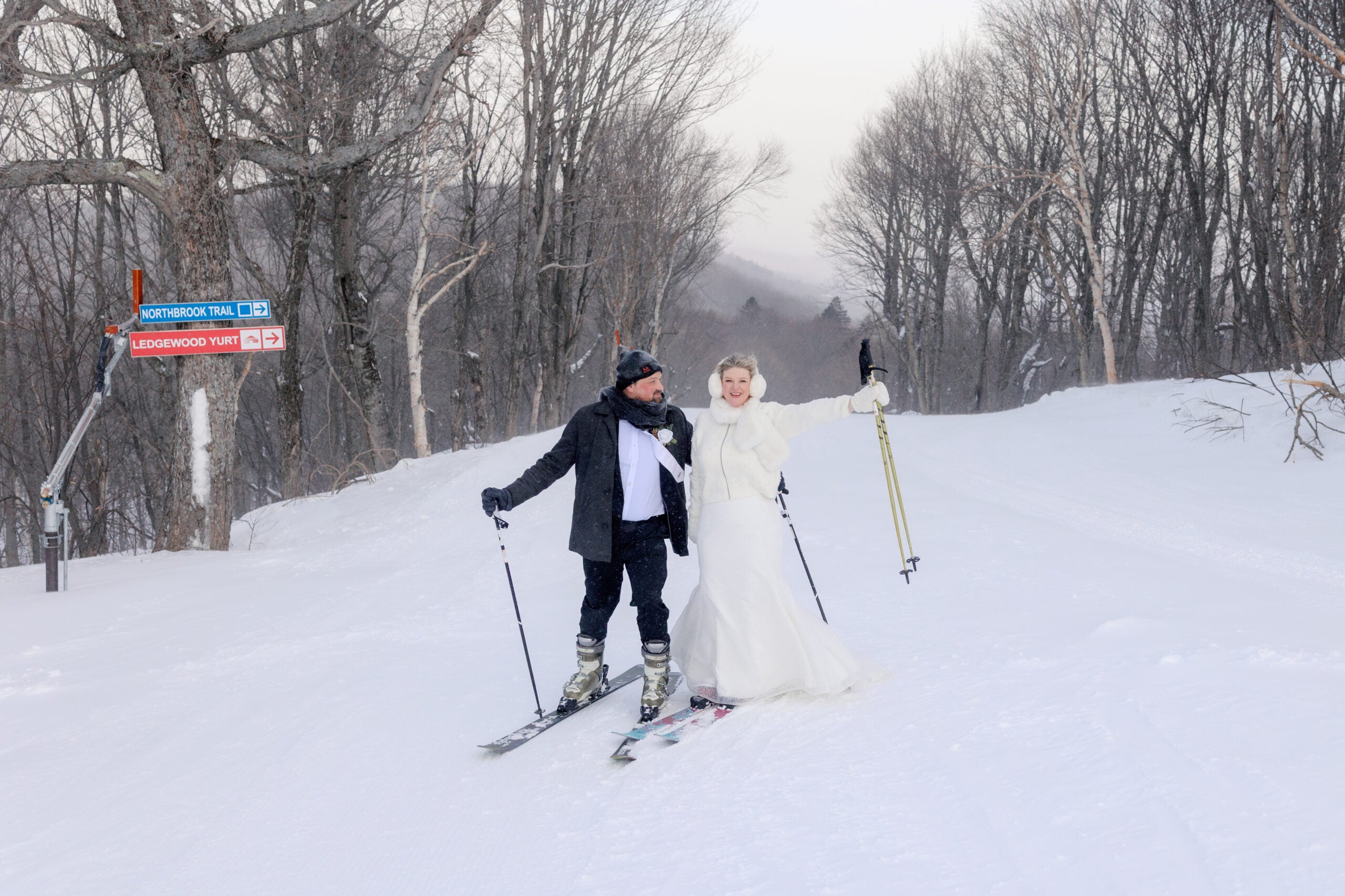 Bride and Groom Ski Killington in Wedding Clothes Right After Vows